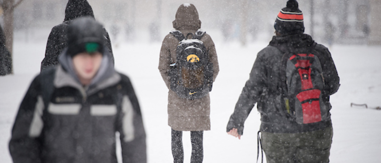 Students Walking in the Snow on the University of Iowa Campus. 