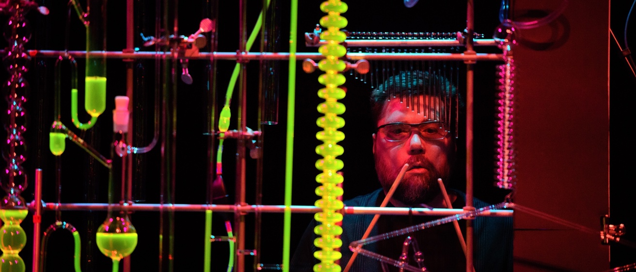 Image of Dan Moore--as part of the collaborative, University of Iowa "Musical Chemistry" Concert.