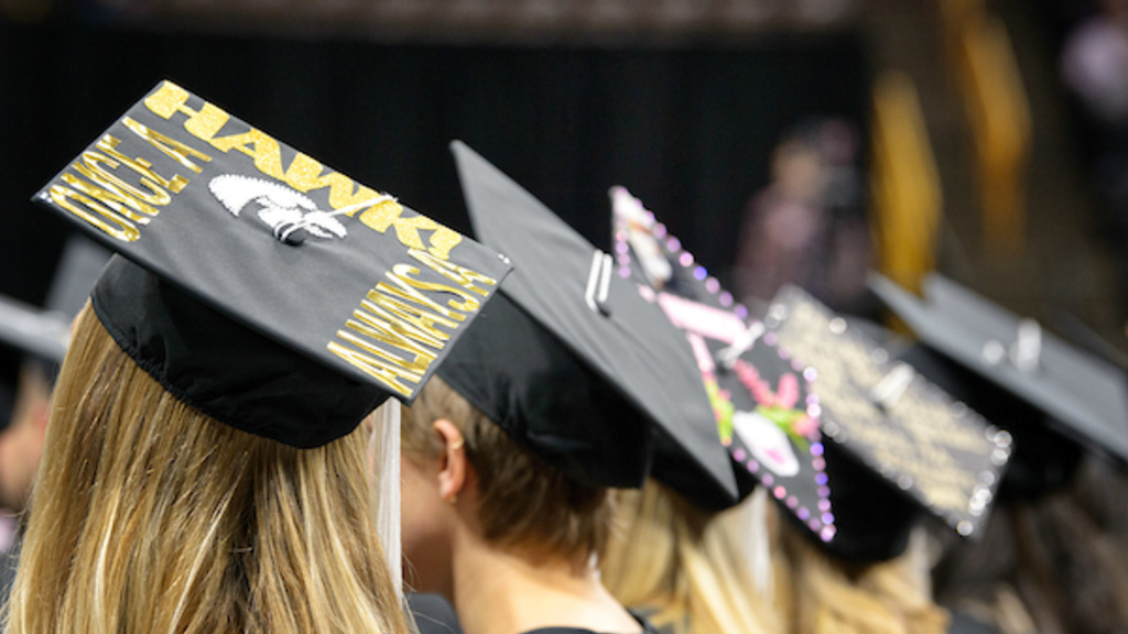 University of Iowa Students at Commencement in their Caps.